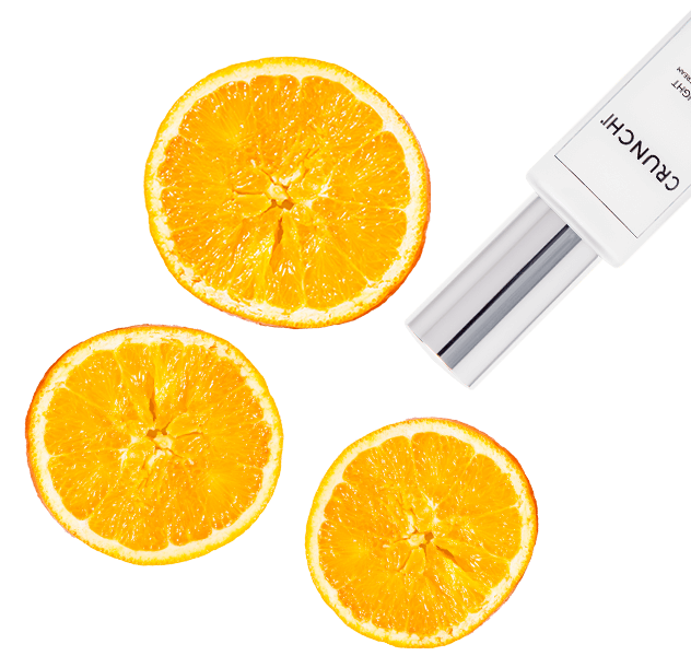 Orange halves with Daylight Facial Cream